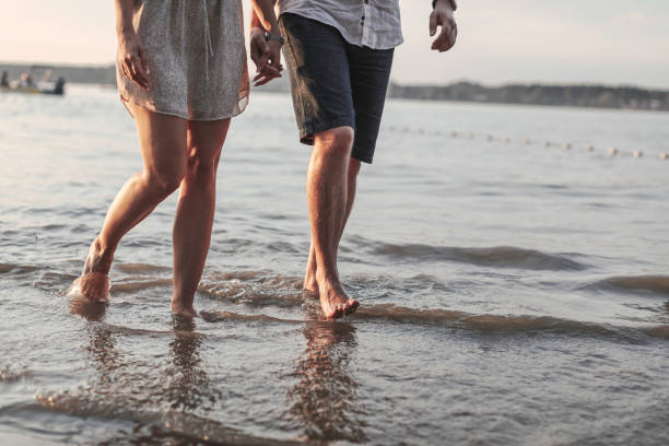 istock Man and woman relaxing in Nature 1264659083
