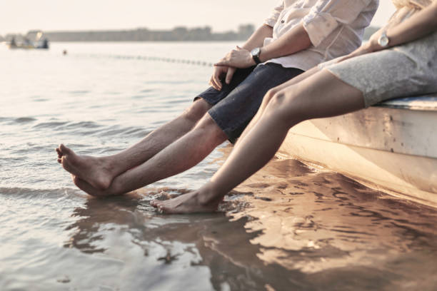 istock Man and woman relaxing in Nature 1264659088