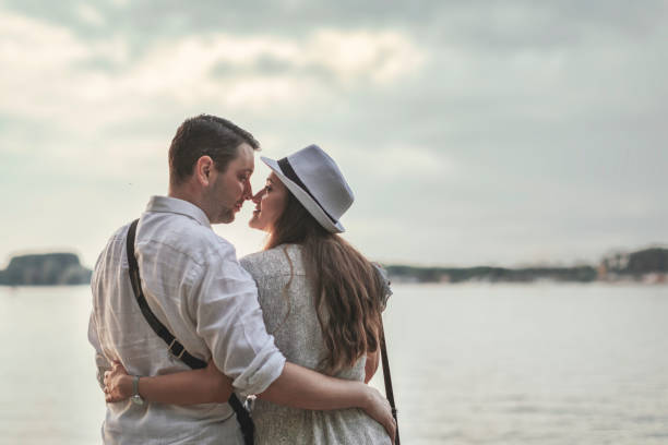 istock Man and woman relaxing in Nature 1264659301