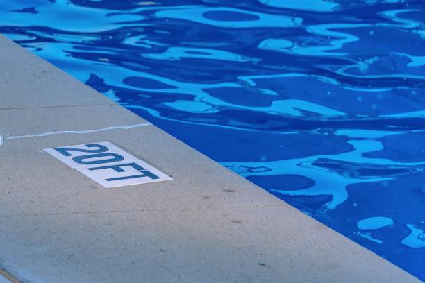 istock 20 foot label by edge of pool 1264669672