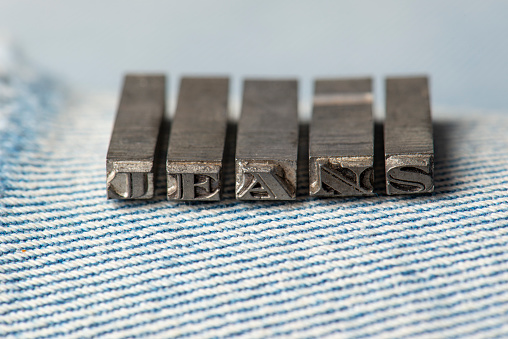 Jeans written with letterpress.