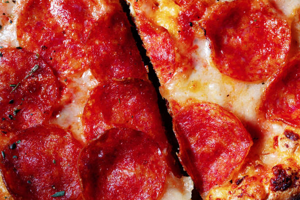 istock Tasty pizza with red sausage 1264670032