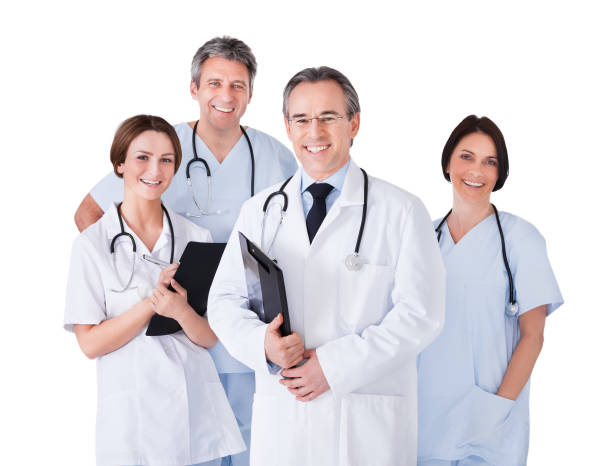 istock Male Doctor In Front Of Team 1264671105