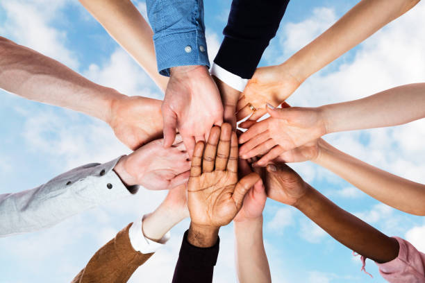 istock Team Spirit Business Huddle. People Diversity 1264671244