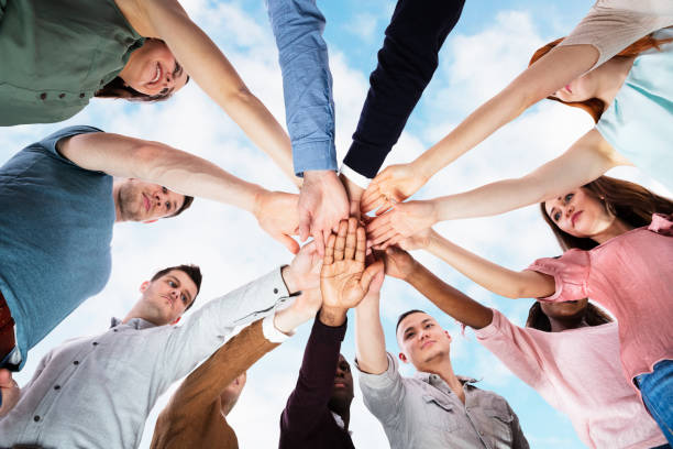 istock Team Spirit Business Huddle. People Diversity 1264671250
