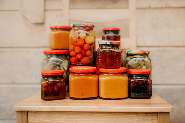 istock homemade preserved vegetables and jam in jars 1264672213