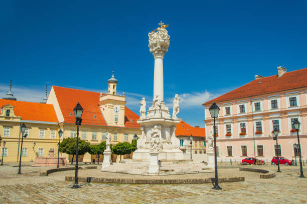 Holy trinity square, historic town of Osijek, Croatia Holy trinity square, pillars with statues in Tvrdja, old historic town of Osijek, Croatia osijek photos stock pictures, royalty-free photos & images