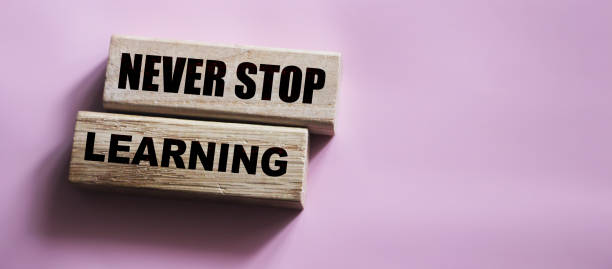 istock Text Never Stop Learning on a wooden blocks. Education concept 1264673180