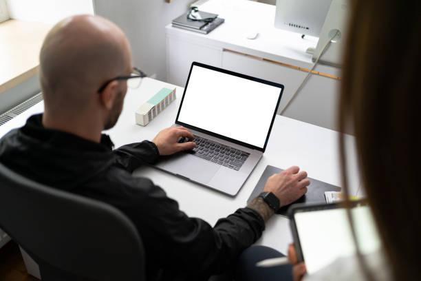 istock Two colleagues discussing new information about products 1264673504