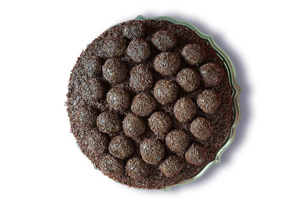 Brigadeiro cake. Traditional Brazilian sweet. Isolated on white background.Copy space