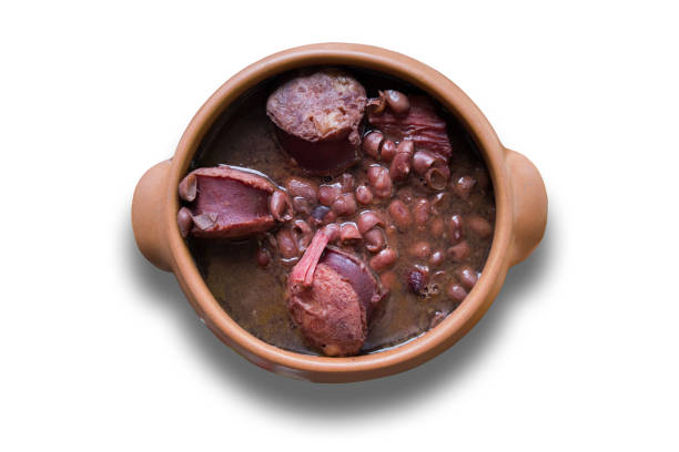istock Feijoada. Traditional Brazilian food. Ceramic bowl isolated on white background. 1264683893