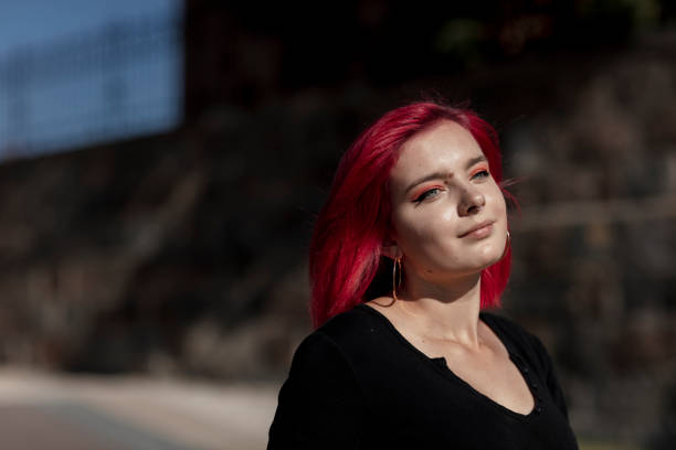 istock Dyed red hair young women 1264683986