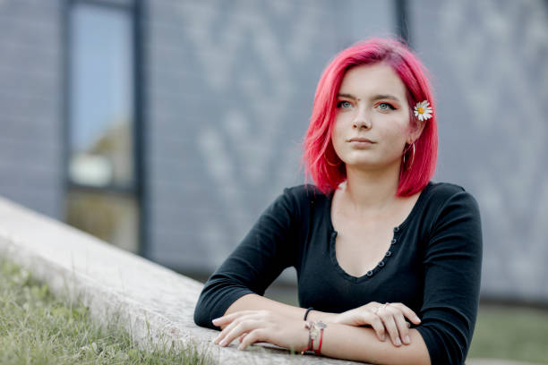 istock Dyed red hair young women 1264684038