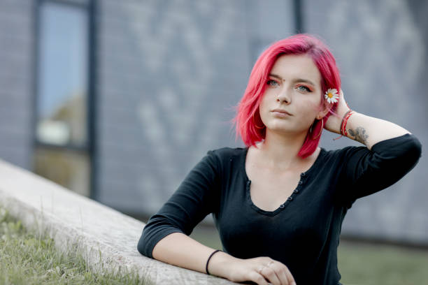istock Dyed red hair young women 1264684073