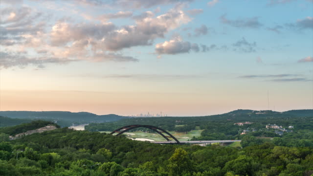 Early Morning Time Lapse of Austin 360 Bridge with Golf Course and Skyline in the Background
