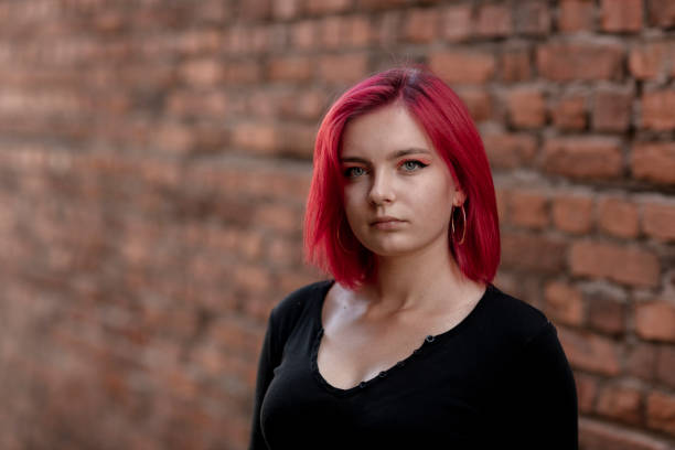 istock Dyed red hair young women 1264684316