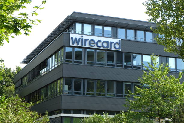 Wirecard Headquarters Building Aschheim, Germany / Bavaria - August 8, 2020: Wirecard bankrupt fintech corporation fortune 500 high-tech German electronic online payment company with logo near Munich Germany. ponzi scheme stock pictures, royalty-free photos & images