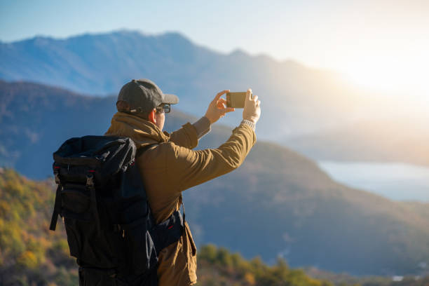 istock Traveler with smartphone 1264686383