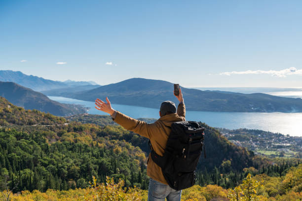 istock Traveler with smartphone 1264686387