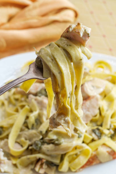 istock Grilled Chicken Piccata Fettuccine 1264686421