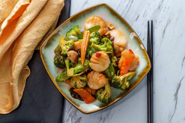 Szechuan Scallops Chinese Vegetables Szechuan stir fried scallops with Chinese Vegetables auriculariales photos stock pictures, royalty-free photos & images