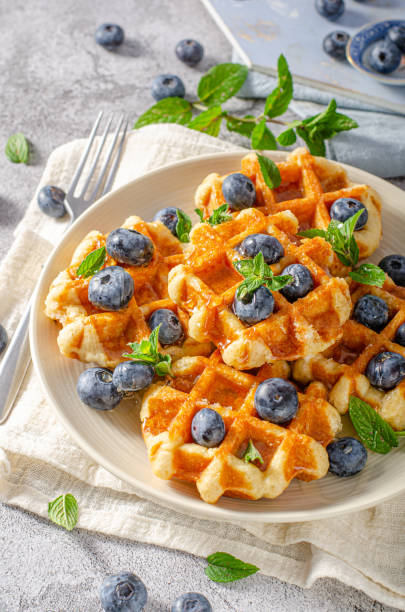 istock Homemade waffles with berries 1264687530