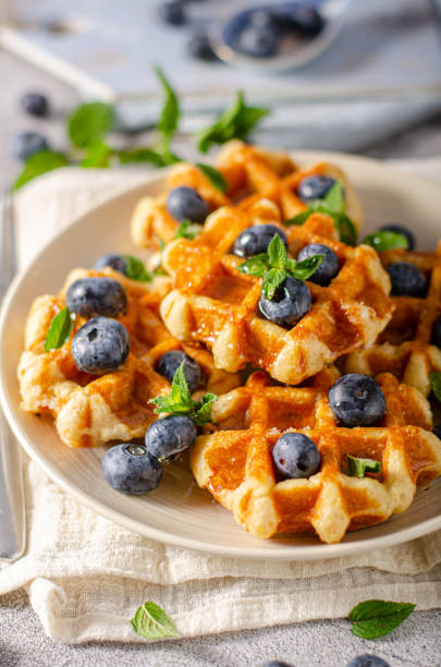 istock Homemade waffles with berries 1264688972