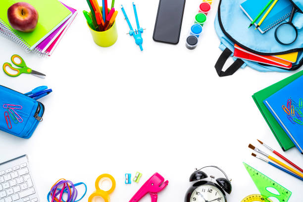 istock School or office supplies border on white background. Copy space 1264689219
