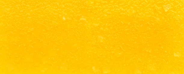 istock Close up orange juice or fruit drink background 1264692630