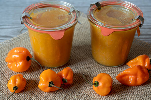 istock Jars of Hot Sauce and Peppers 1264692786