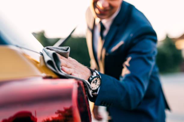 istock Businessman car valeting and washing 1264693442