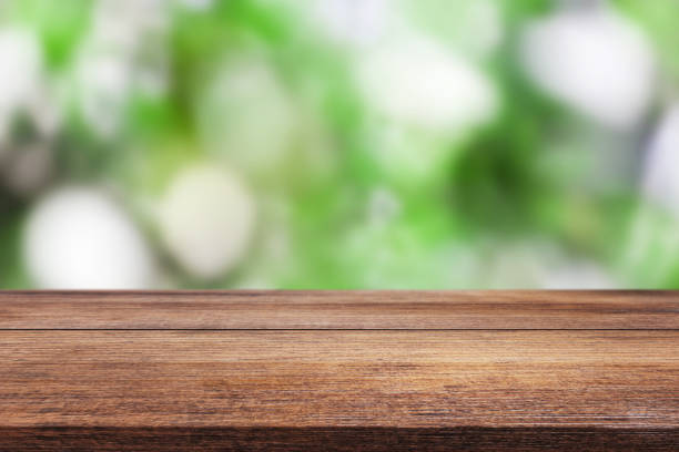 istock Wooden beautiful table on blurred bokeh background 1264693912