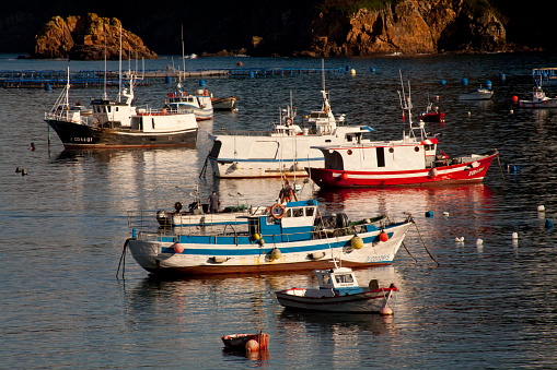 Boats sit in Bahia de la Concha in Donostia-San Sebastian