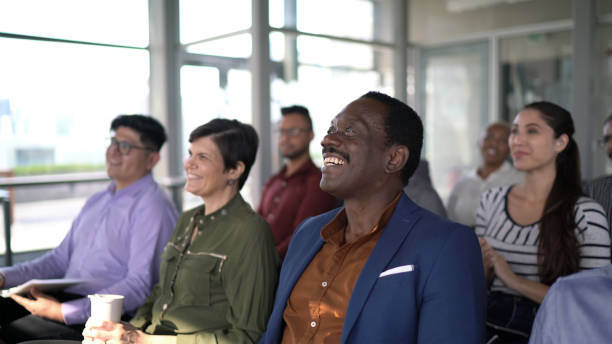 istock Business people attending a conference in a convention center 1264700649