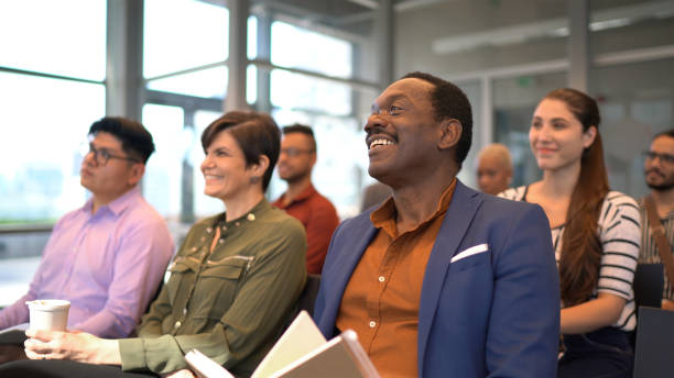 istock Business people attending a conference in a convention center 1264701493