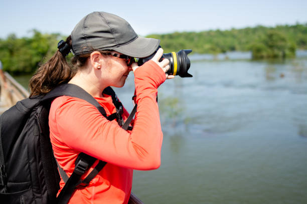 istock Tourist having fun in Iguazu falls 1264701529