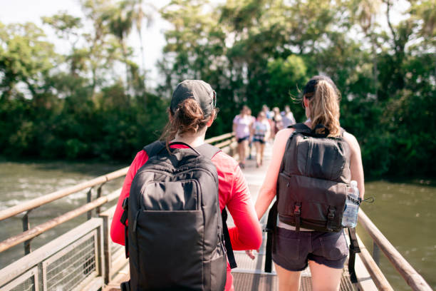 istock Tourist having fun in Iguazu falls 1264701546