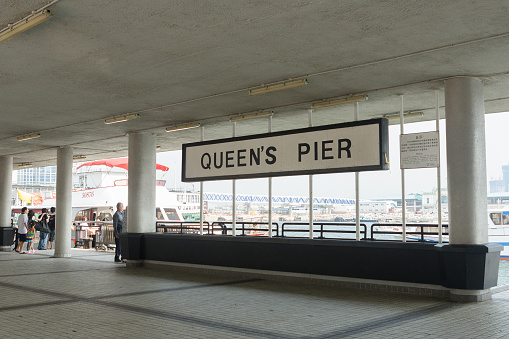 General view of the Queen's Pier in Edinburgh Place, Central, Hong Kong. It served not only as a public pier in day-to-day use but also as a major ceremonial arrival and departure point. The pier witnessed the official arrival in Hong Kong of all of Hong Kong's governors since 1925.