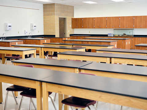 An empty high school science classroom.