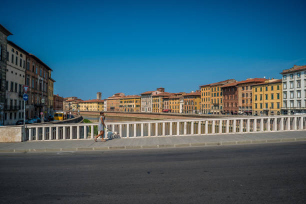 Mezzo bridge over the Arno river in Pisa, Italy The Ponte di Mezzo ("Middle Bridge"), commonly known as the Ponte Conte Ugolino, is a bridge over the Arno in Pisa, Italy. It connects Piazza Garibaldi, north of the Arno (part of the city called Tramontana) to Piazza del XX Septembre, south (Mezzogiorno). Built between 1947 and 1950, it replaces a three-arched bridge dating from the mid-seventeenth century, destroyed by bombing during World War II. 2273 stock pictures, royalty-free photos & images