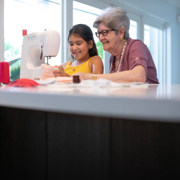 Teaching my granddaughter to use a sewing machine