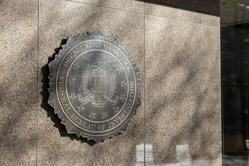Seal of the Federal Bureau of Investigation (FBI) outside their headquarters in Washington, D.C.