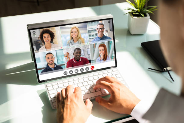 istock Businessman videoconferencing with doctor on laptop 1264709793