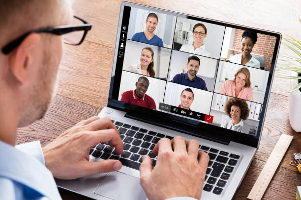 istock Businessperson Videoconferencing On Laptop 1264709847