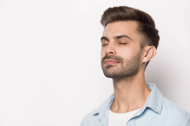 istock Close up portrait with peaceful handsome bearded man. 1264711413