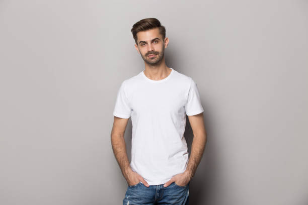 istock Portrait with smiling handsome bearded man in white t-shirt. 1264711432