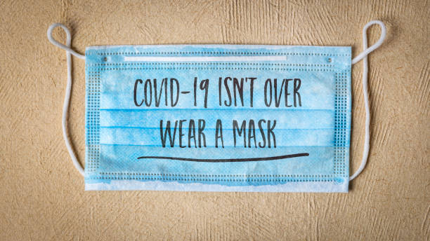 istock covid-19 is not over, wear a face concept 1264711651