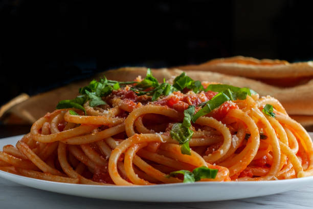 Bucatini All'Amatriciana - Wikipedia, the free encyclopedia Authentic Italian bucatini all'amatriciana made with san marzano tomatoes and garnished with fresh chopped basil and grated pecorino romano cheese all'amatriciana stock pictures, royalty-free photos & images