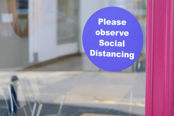 istock Social distancing sign for shop business customer queue 1264716793