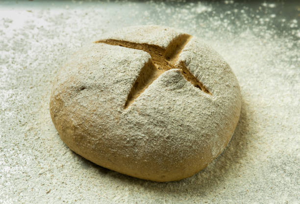 istock The process of making bread. The chef kneads the dough by hand.The dough is ready for baking. 1264717896